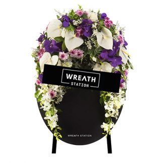 "พวงหรีดดอกไม้สดโทนสีม่วง เอกลักษณ์ที่มีแค่ Wreath Station ที่เดียว "